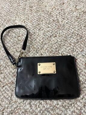 Michael Kors Black Patent Wristlet with Gold Plaque